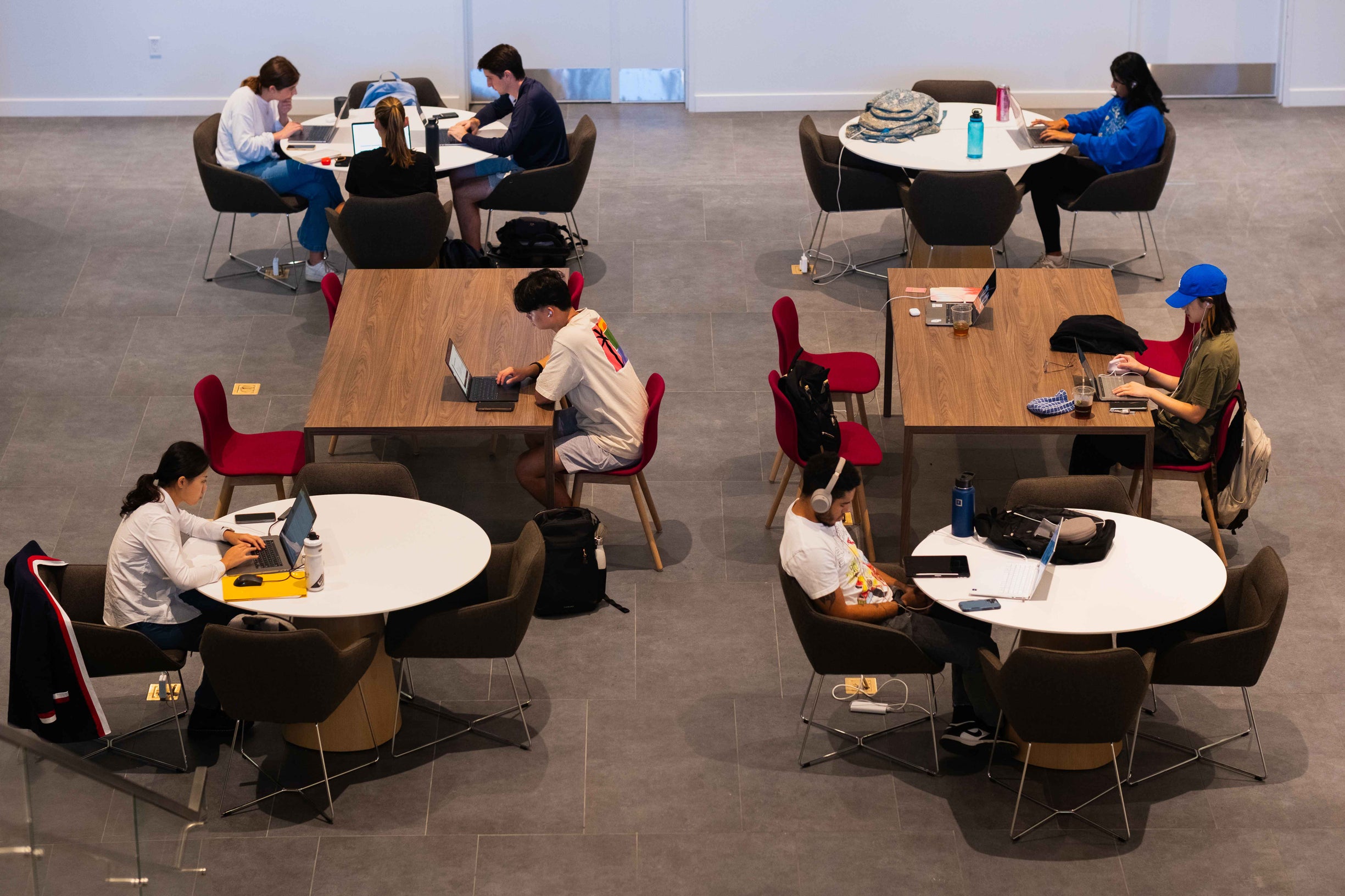 Students typing on their computers.