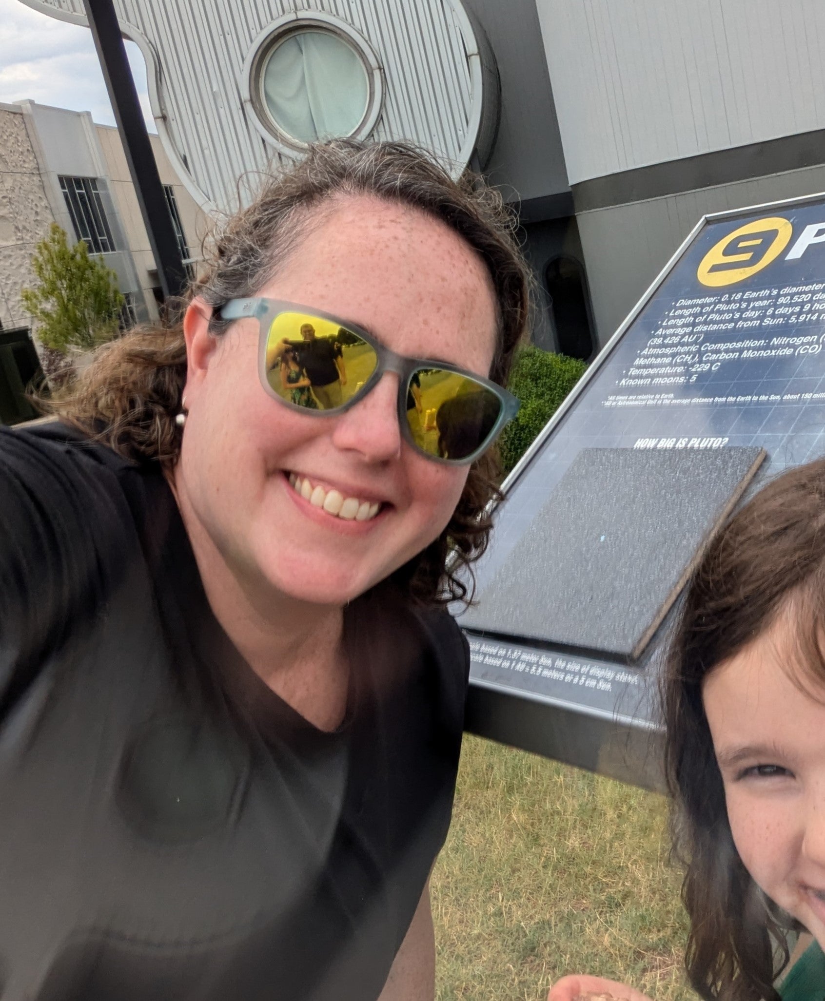 Kate in front of Pluto, US Space and Rocket Center, Huntsville