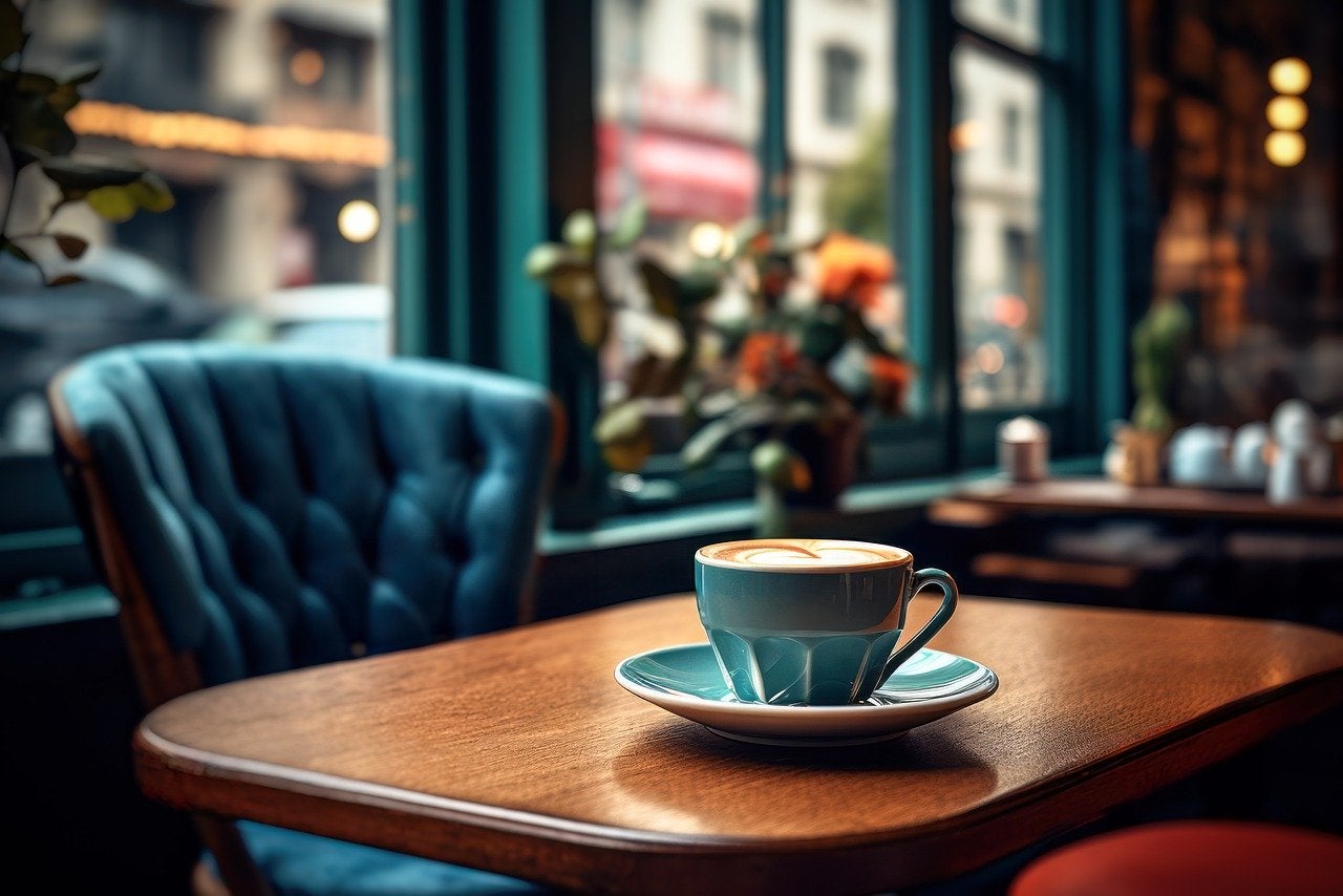 Cup of Coffee on a desk.
