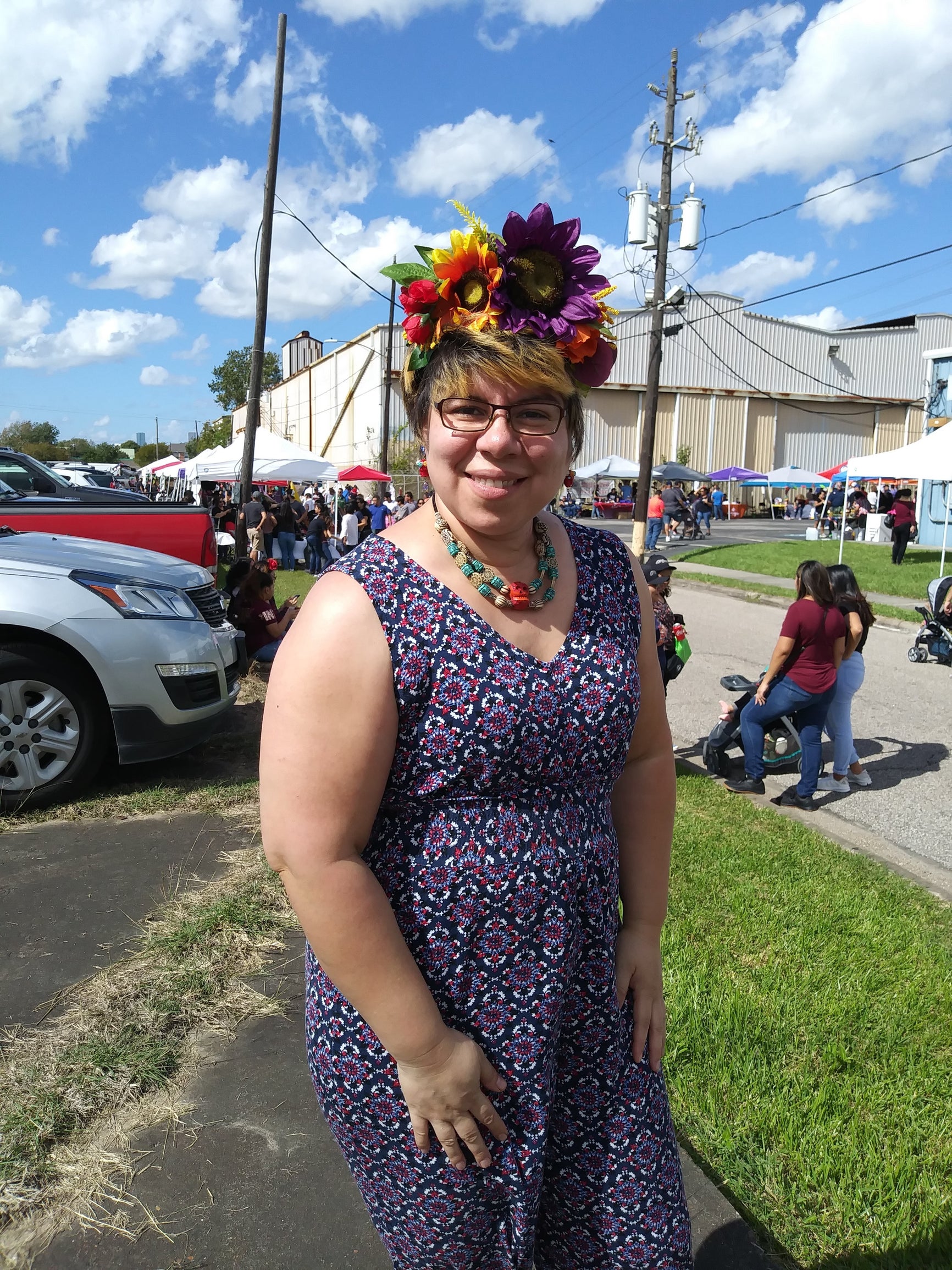 Patty Diaz outside with flowers in her hair