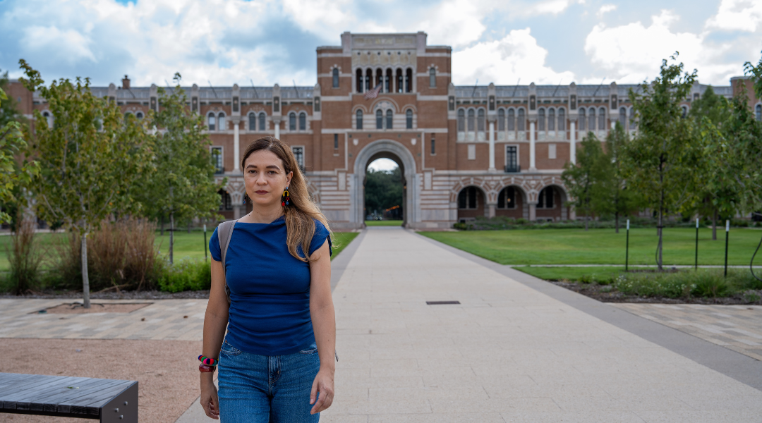 Alejandra Osejo Varona walks through Rice's Academic Quad