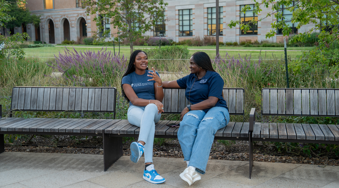 Graduate student talk in the academic quad during 'Quad Talk'