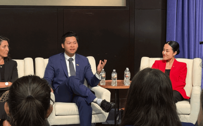 Photo by Nathaniel Uy - photo of Nathaniel presenting at a conference