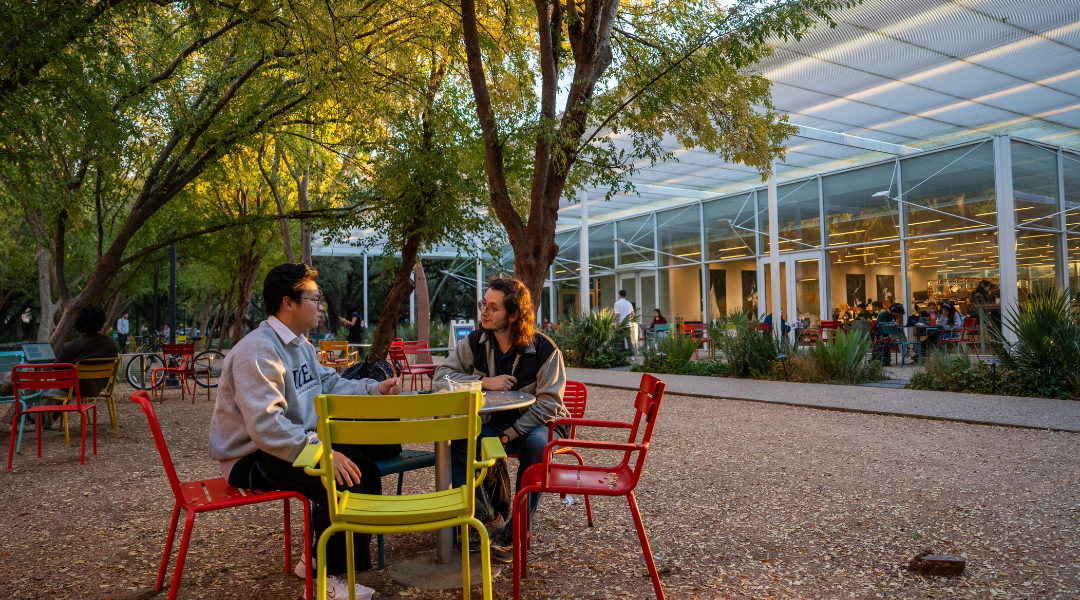 Graduates students near Brochstein Pavilion in the Central Quad at Rice