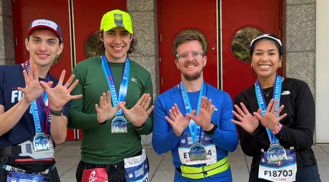Rice graduate students pose after finishing the Chevron Houston Marathon