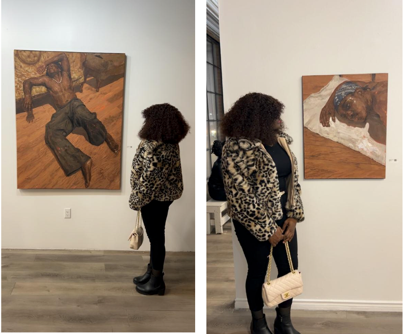 Osinachi Looking at Art work on a wall