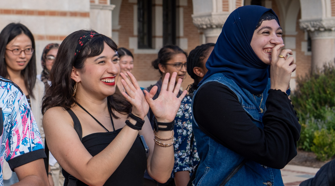 New doctoral students walk through the Sallyport