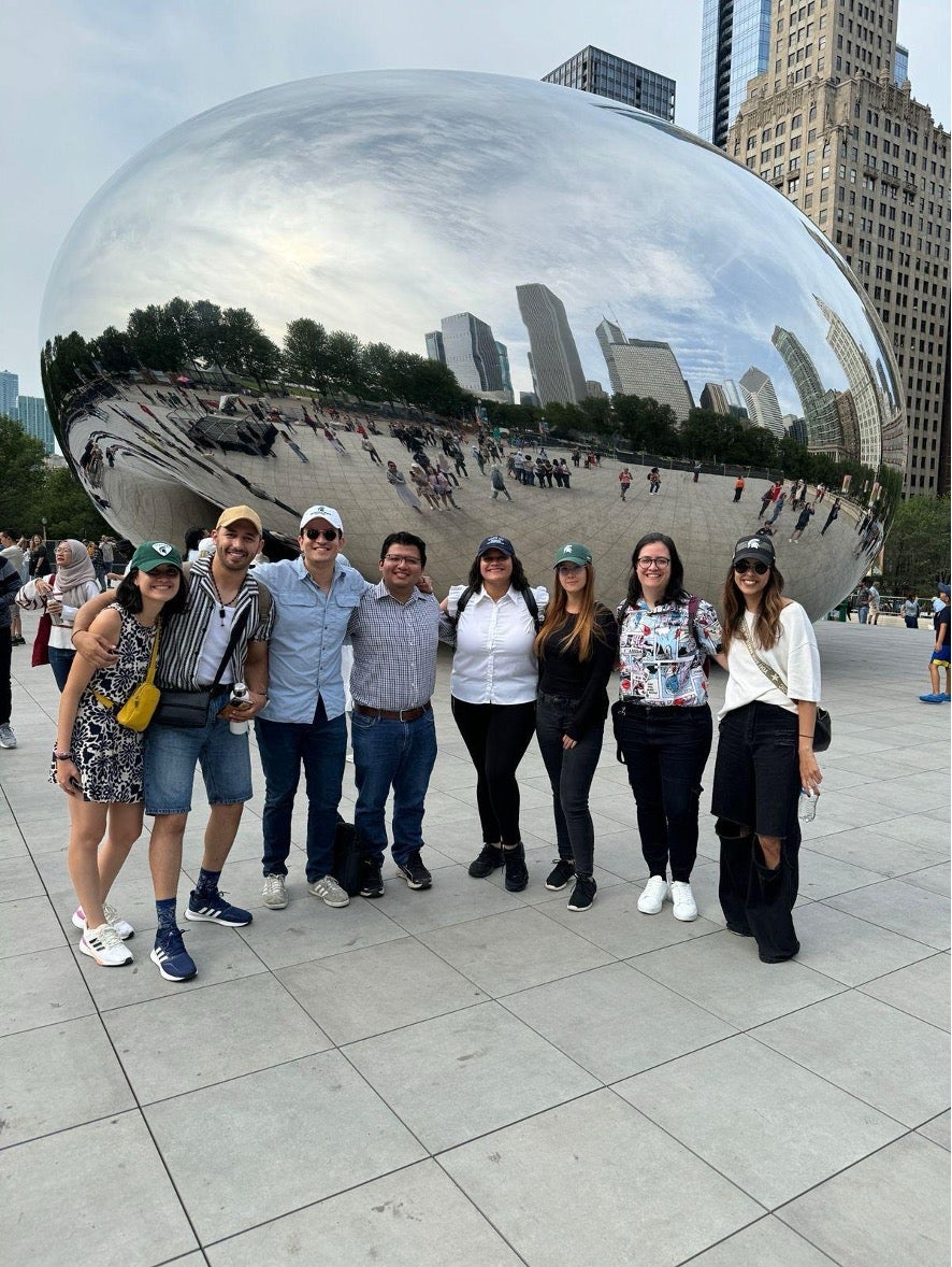 Brandon and friends in front of the Bean
