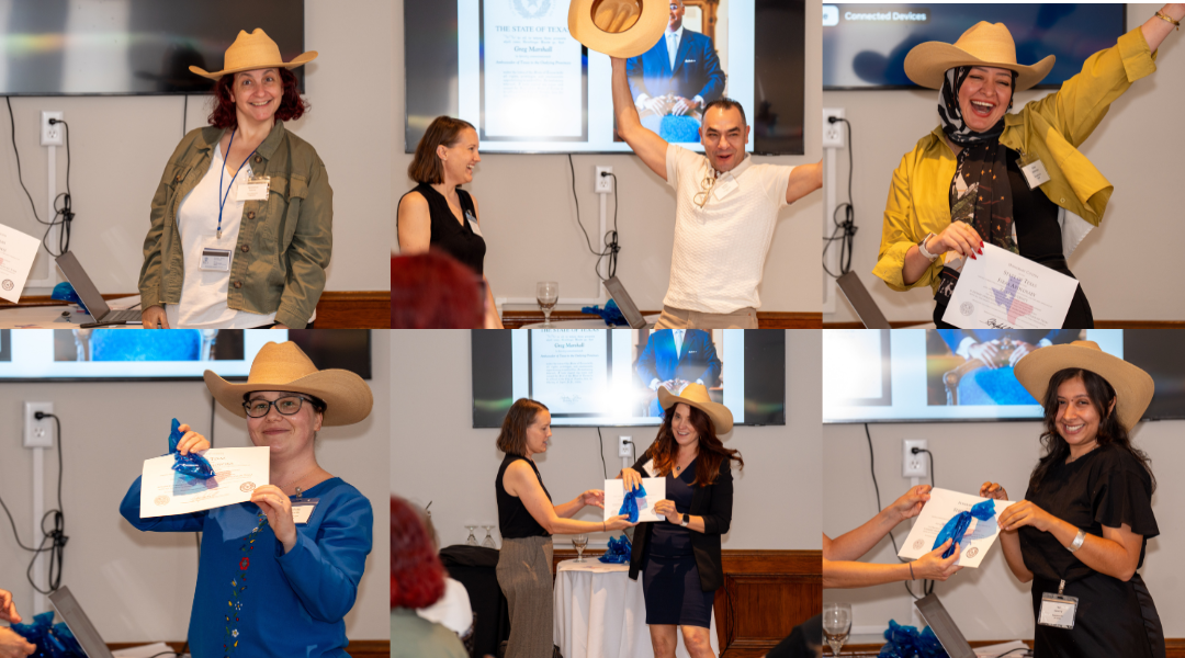 EDUSA advisers receive honorary Texan certifcates and pose with a cowboy hat