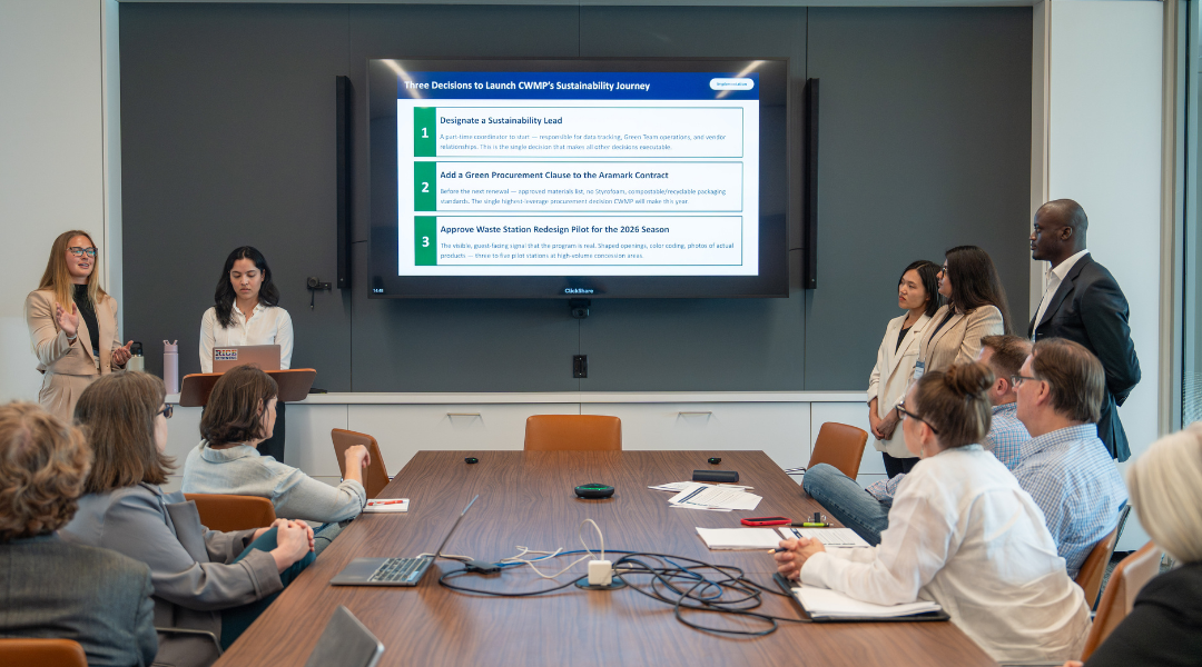 Graduate students present to Woodlands Pavilion staff member