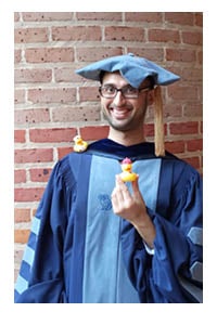 Souptik Barua '19 with his ducks at convocation