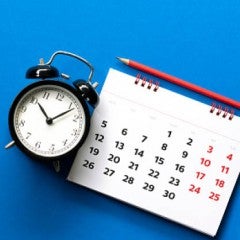 Clock and calendar on a blue background