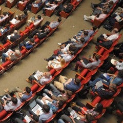 People gathered in auditorium for conference
