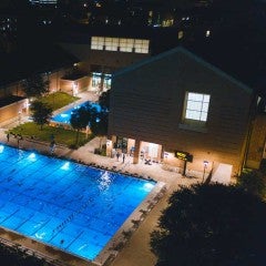 swimming pool at night on the Rice University campus.