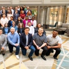 The 2025 Frédéric Bastiat Fellows and Mercatus Center Scholars. Brandon is spotted in the front row, gray suit.