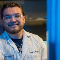 Graduate student Edgar Villegas in the lab