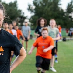 Ellie Moreland with Houston Dynamo FC Unified Team teammates 