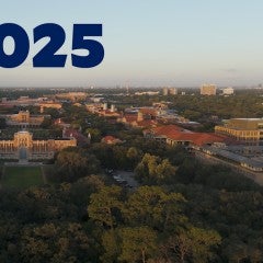 An aerial shot of Rice University with 2025 on the skyline