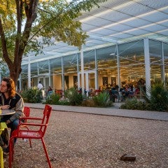 Graduates students near Brochstein Pavilion in the Central Quad at Rice