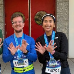 Rice graduate students pose after finishing the Chevron Houston Marathon