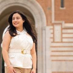 Katherine Coreas poses in front of Lovett Hall