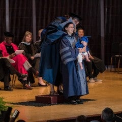 Rice’s tiniest cap and gown