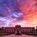 After a storm, the sky over Rice University glows purple, pink, yellow and orange.