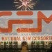 GEM logo superimposed over an image of Lovett Hall, backed by fireworks.