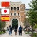 students walking by Sallyport with six country's flags pasted over the top of the image