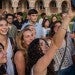 Grad students pose for a selfie in the Sallyport procession