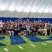 Graduate students with the Rice football team