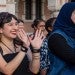 New doctoral students walk through the Sallyport